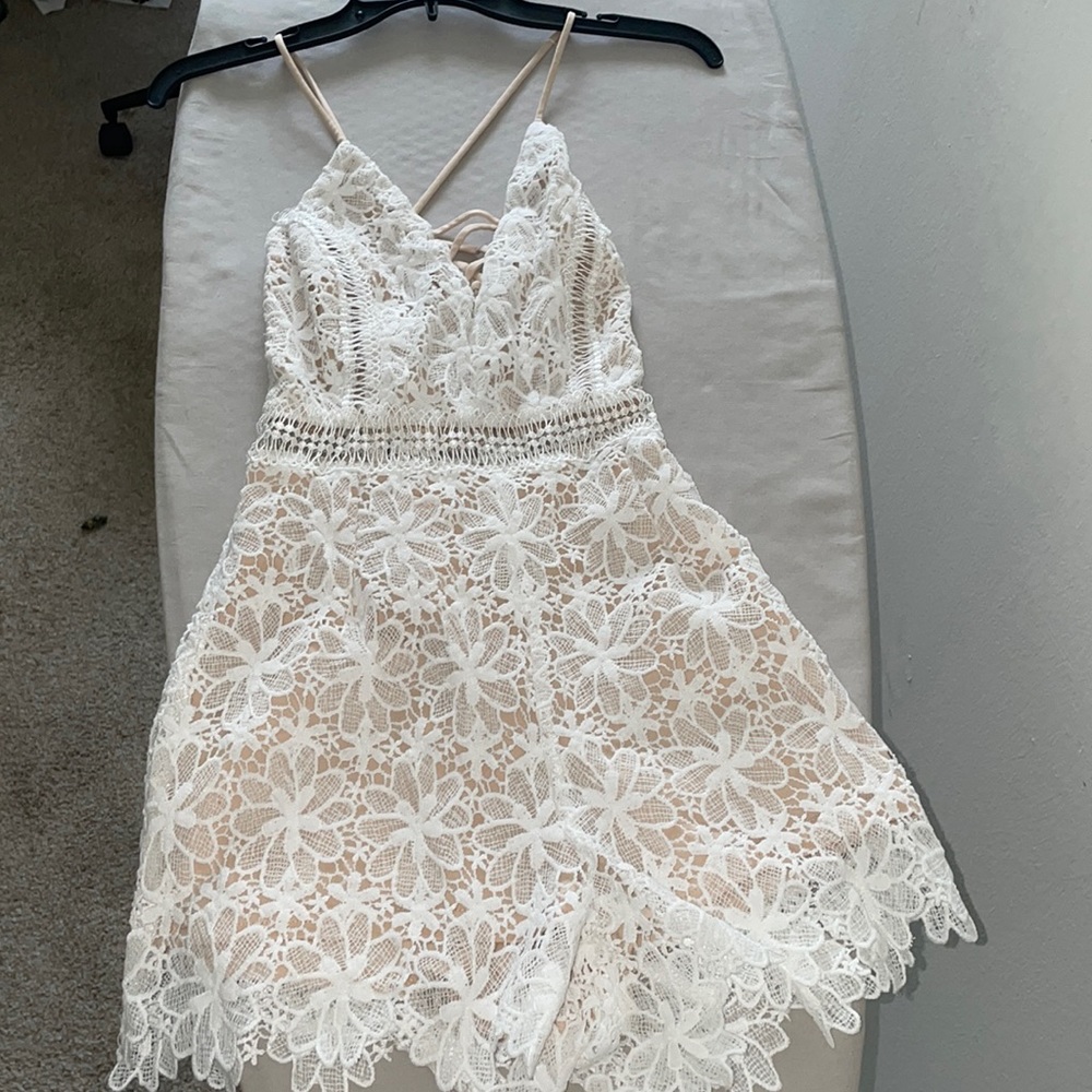 Lace romper with criss cross back